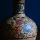 Hand-painted terracotta jug
