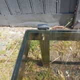 Table basse chrome et verre fumé