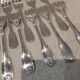 11 silver-plated cake forks with PP shell decor