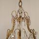 French gilt bronze three-light cage chandelier with pink and clear beaded swags.
