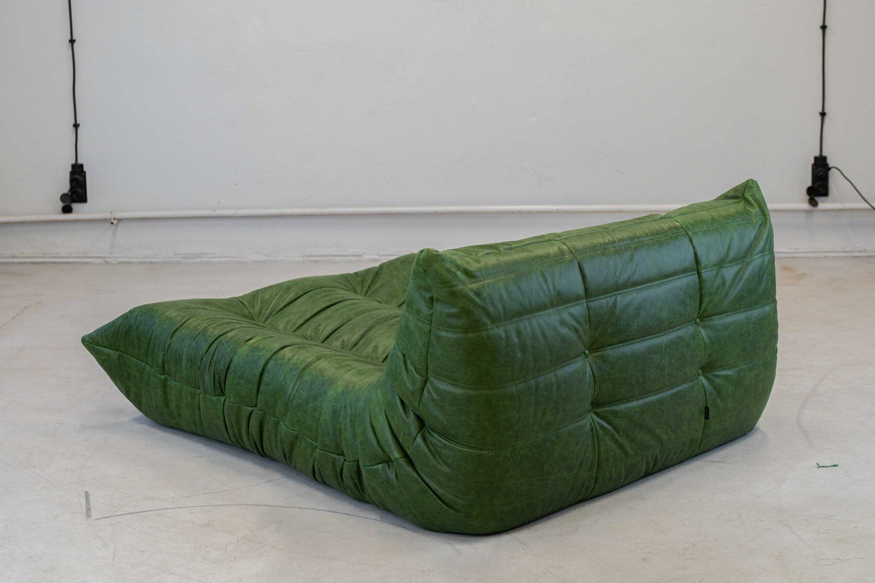 Togo chaise lounge in green leather attributed to Michel Ducaroy for Ligne Roset, 1974