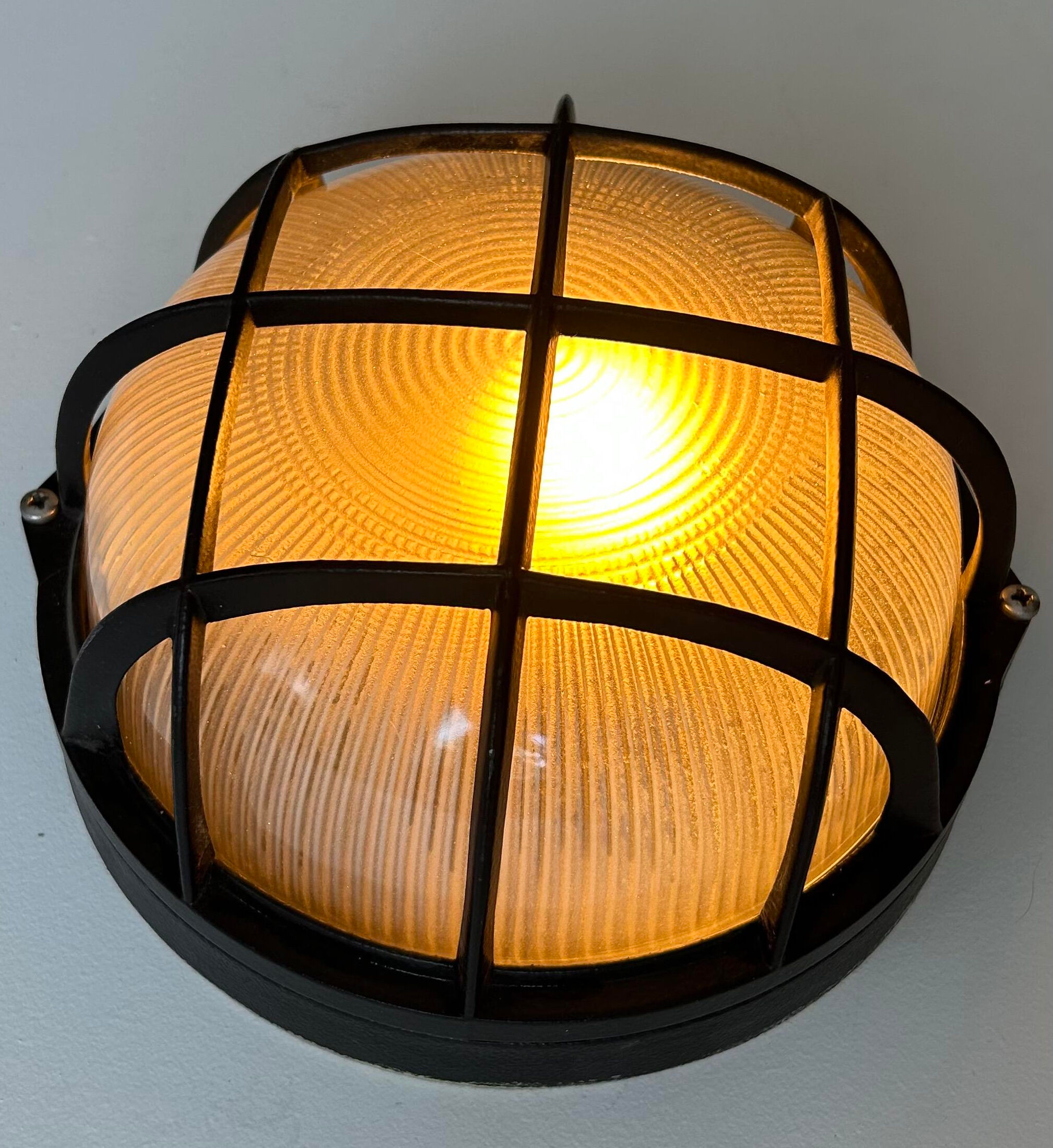 Vintage wall lamp, black metal and ridged glass, France 1980.