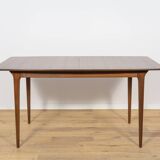 Extendable teak dining table in Mid-Century style from McIntosh, UK.