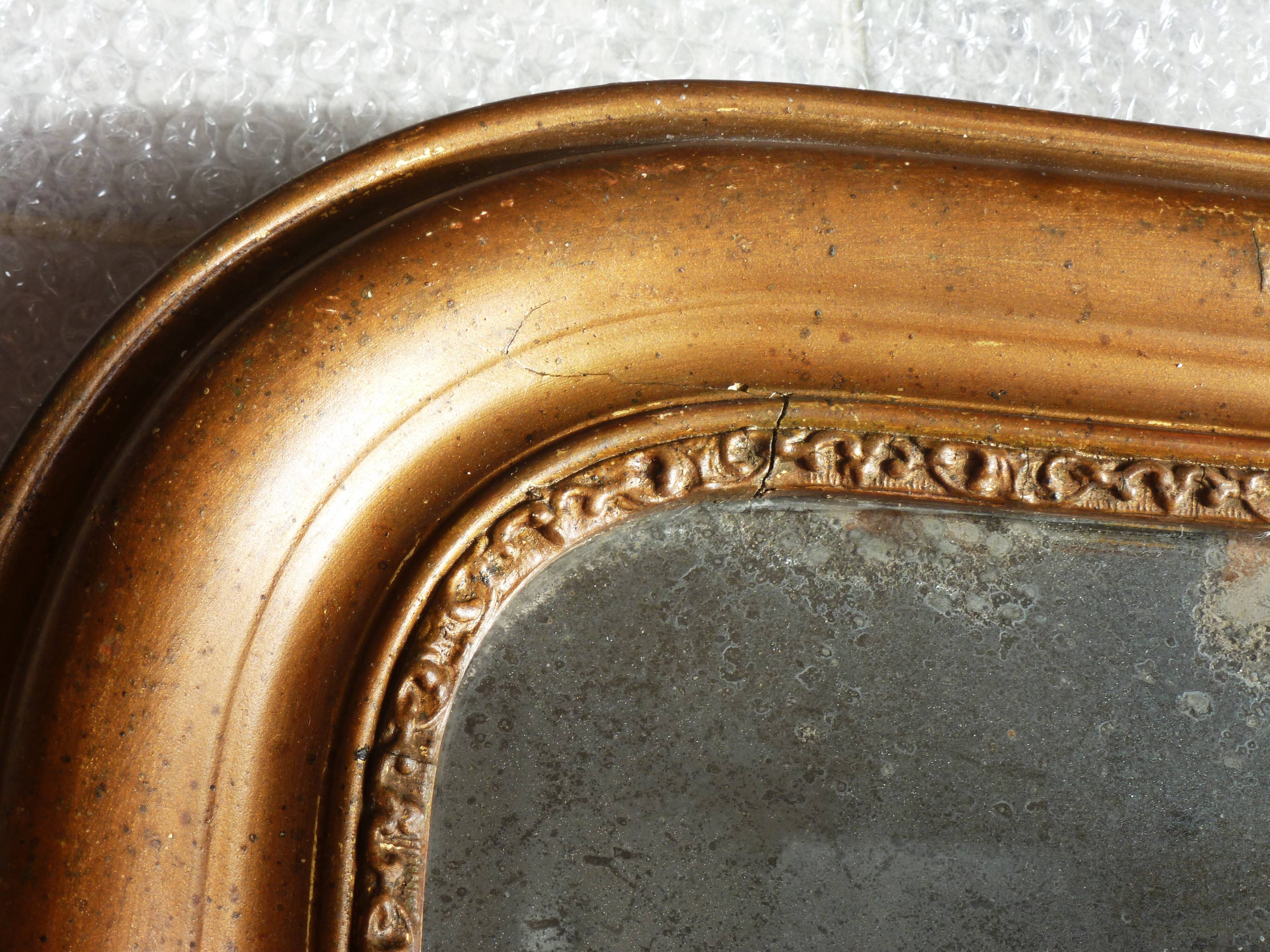 Large Louis-Philippe mercury mirror, antique mirror decoration.
