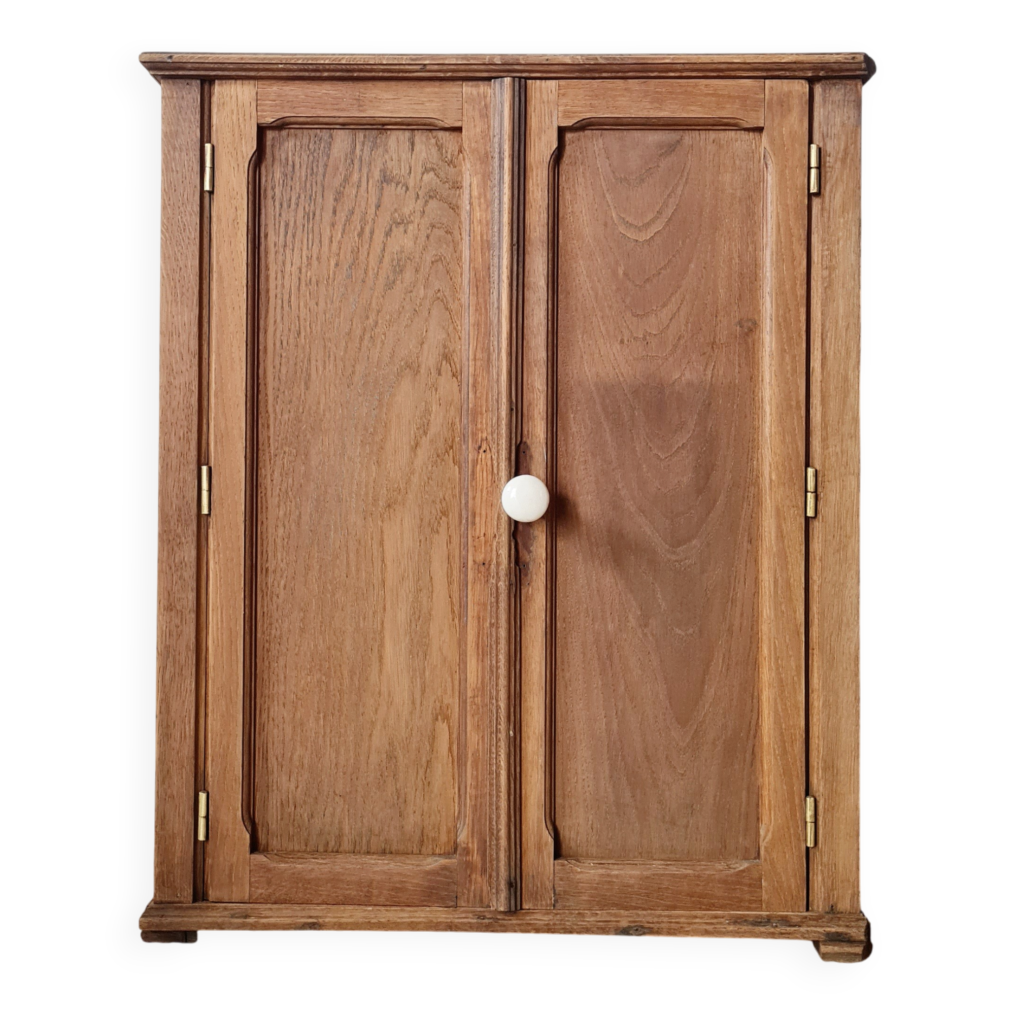 Small Parisian oak wardrobe with its porcelain knob.