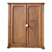 Small Parisian oak wardrobe with its porcelain knob.