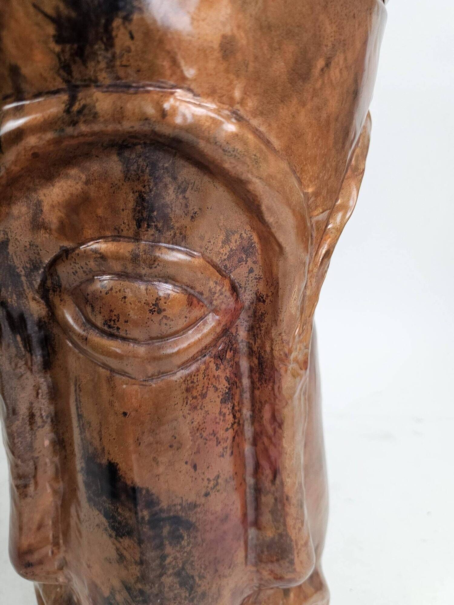 Sculptural copper umbrella stand with tribal faces, 1970s