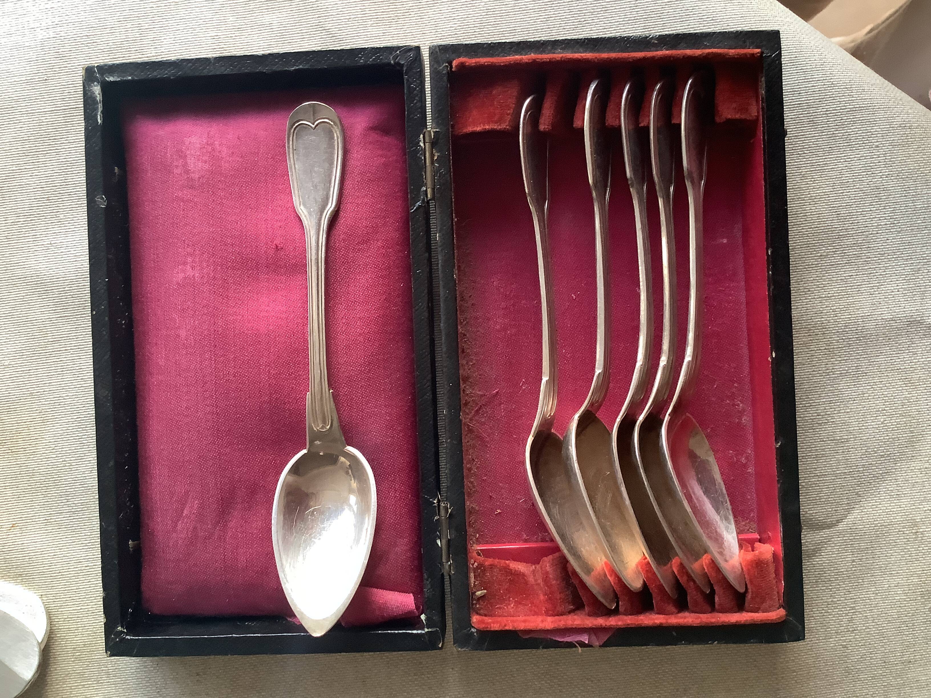 Small silver-plated metal spoons