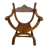 Siège, fauteuil Dagobert curule en noyer sculpté style Renaissance