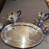 Coffee and the service in silver metal flagship