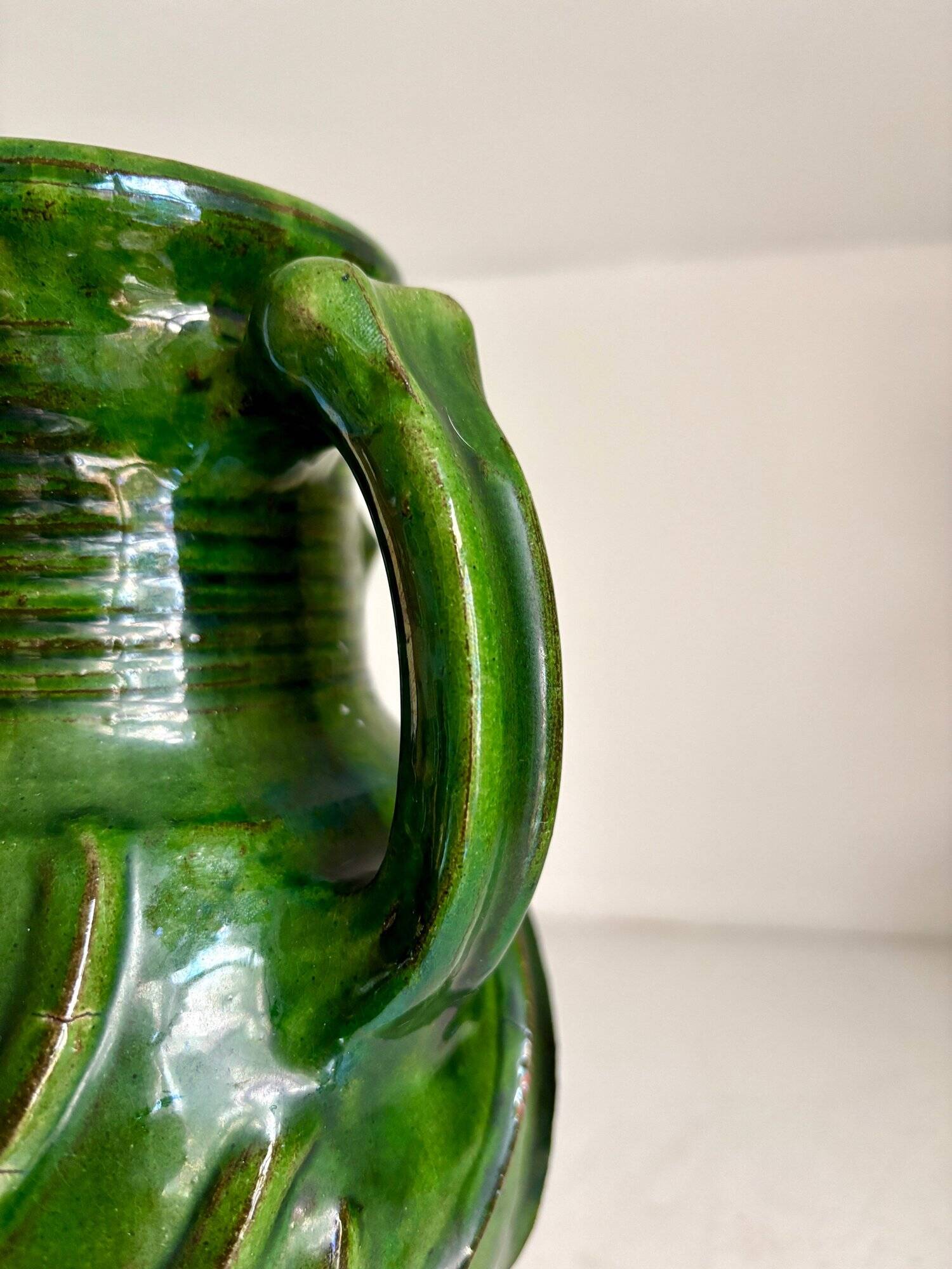 Green glazed terracotta pitcher