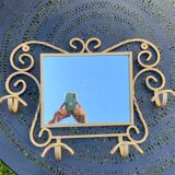 Wall-mounted gilded wrought iron coat rack with mirror