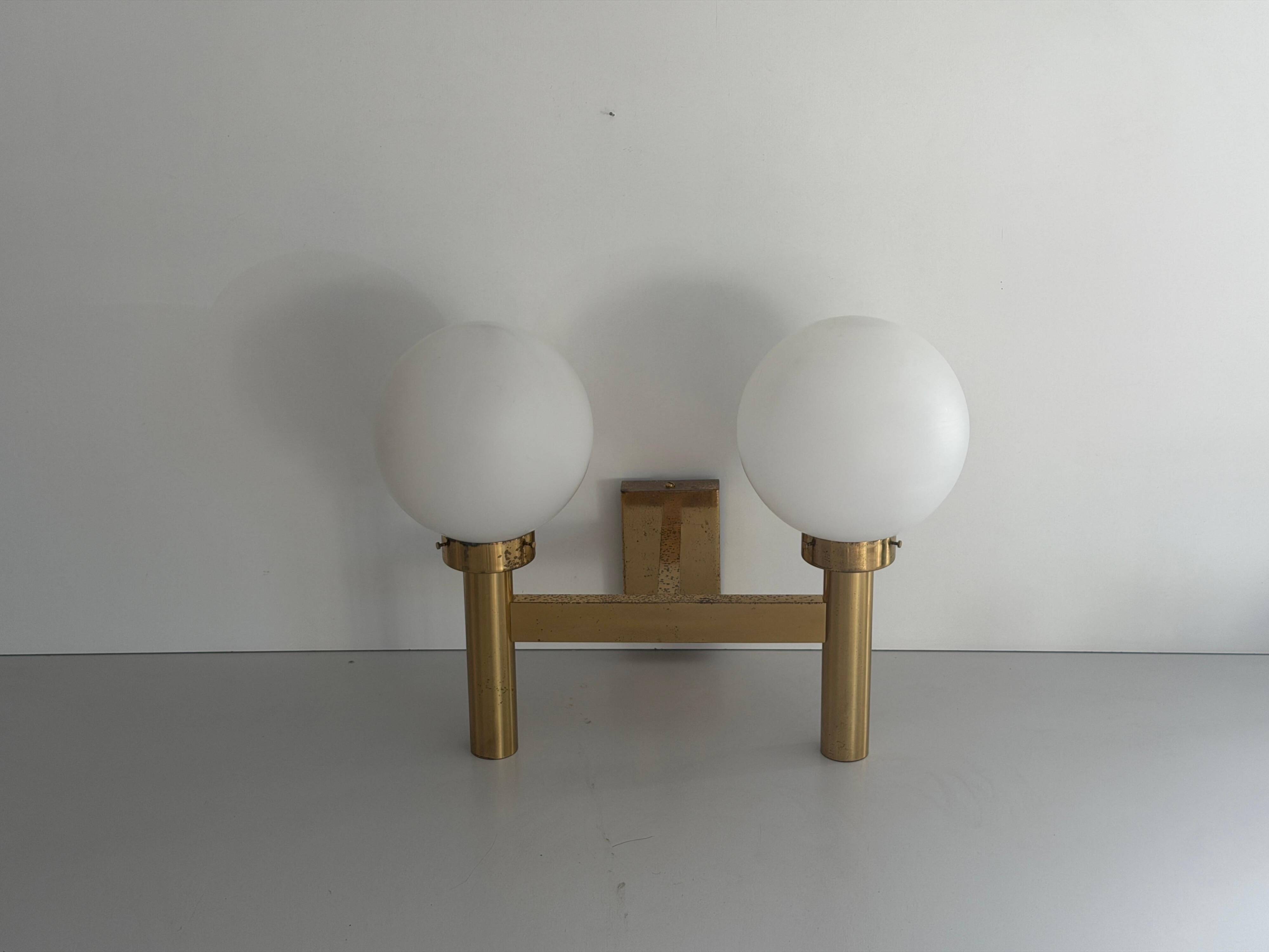 Double opal glass and heavy brass, large minimalist cinema wall light, 1960s, Germany