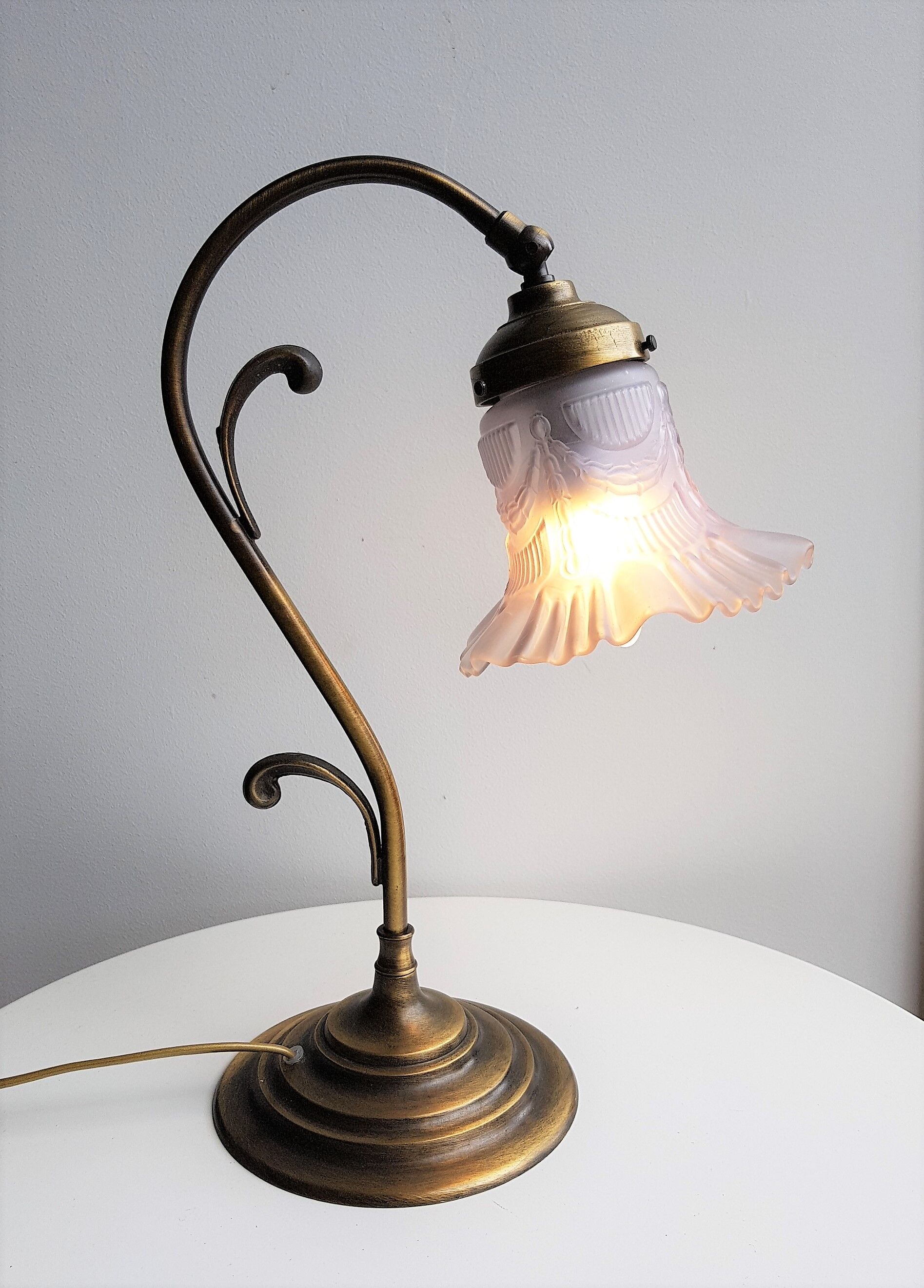 Articulated in brass and frosted glass lamp