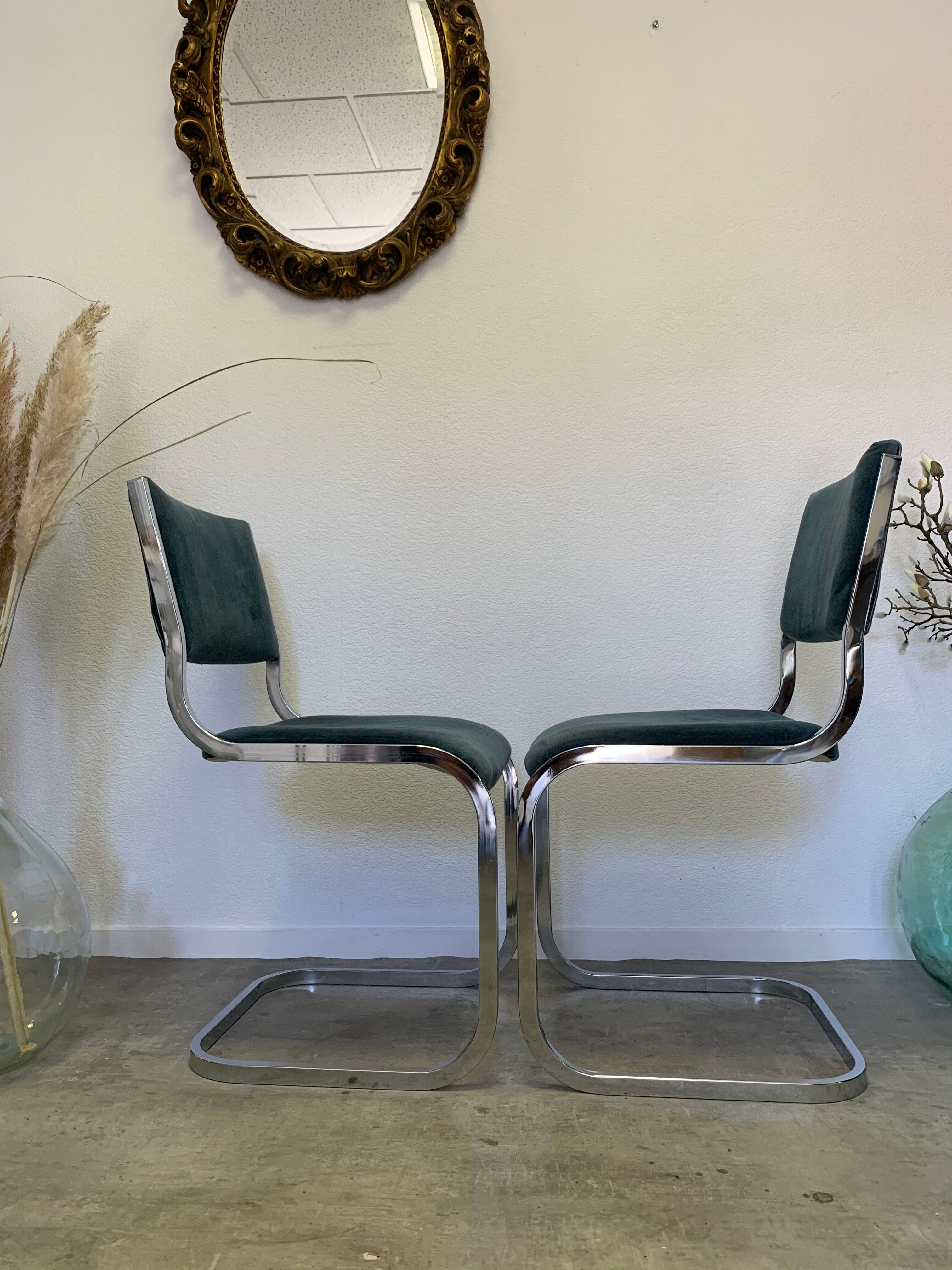 Pair of chrome blue chairs  70
