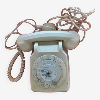 Téléphone blanc à cadran numèrique + écouteur.Annèes 60.