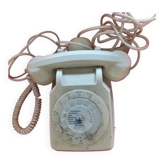 Téléphone blanc à cadran numèrique + écouteur.Annèes 60.