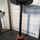 Bistro standing table with marble top and cast iron base.