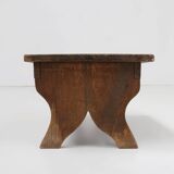 Small rustic wooden stool with curved base, France ca. 1900