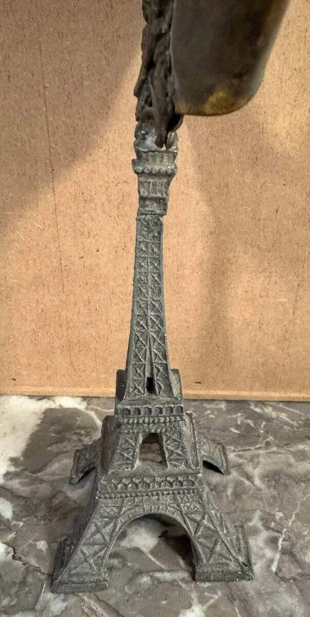 Pair of brass mirrors from the Art Deco period perched on the Eiffel Tower.