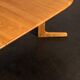 Oval dining table with 2 extensions.