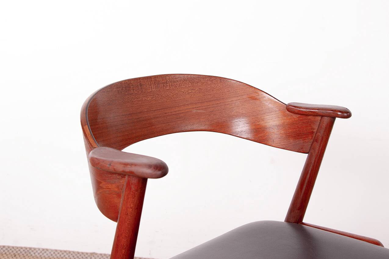 Danish armchair in teak and Skai, by Henning Kjaernulf for Korup Stolefabr.