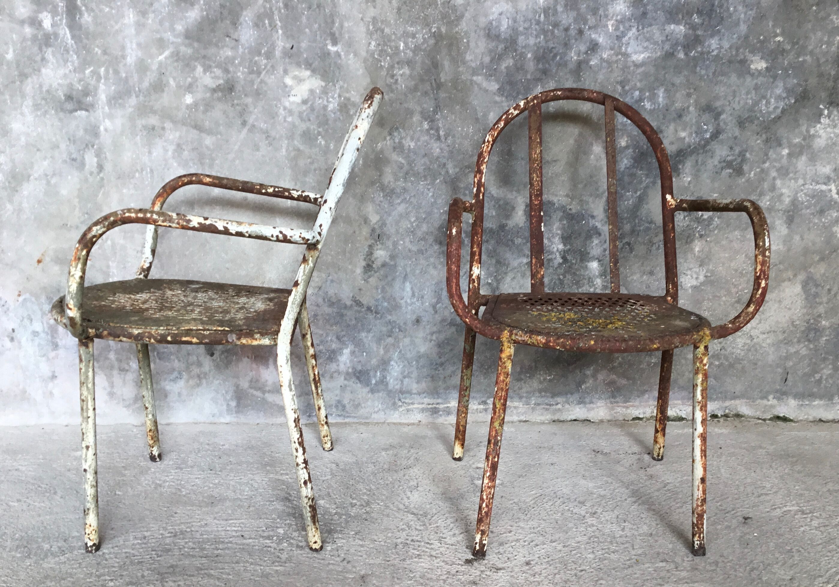 Pair of metal armchairs