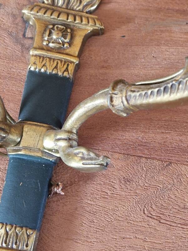 Pair of Empire style wall sconces in gilded bronze and green lacquer.