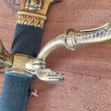 Pair of Empire style wall sconces in gilded bronze and green lacquer.