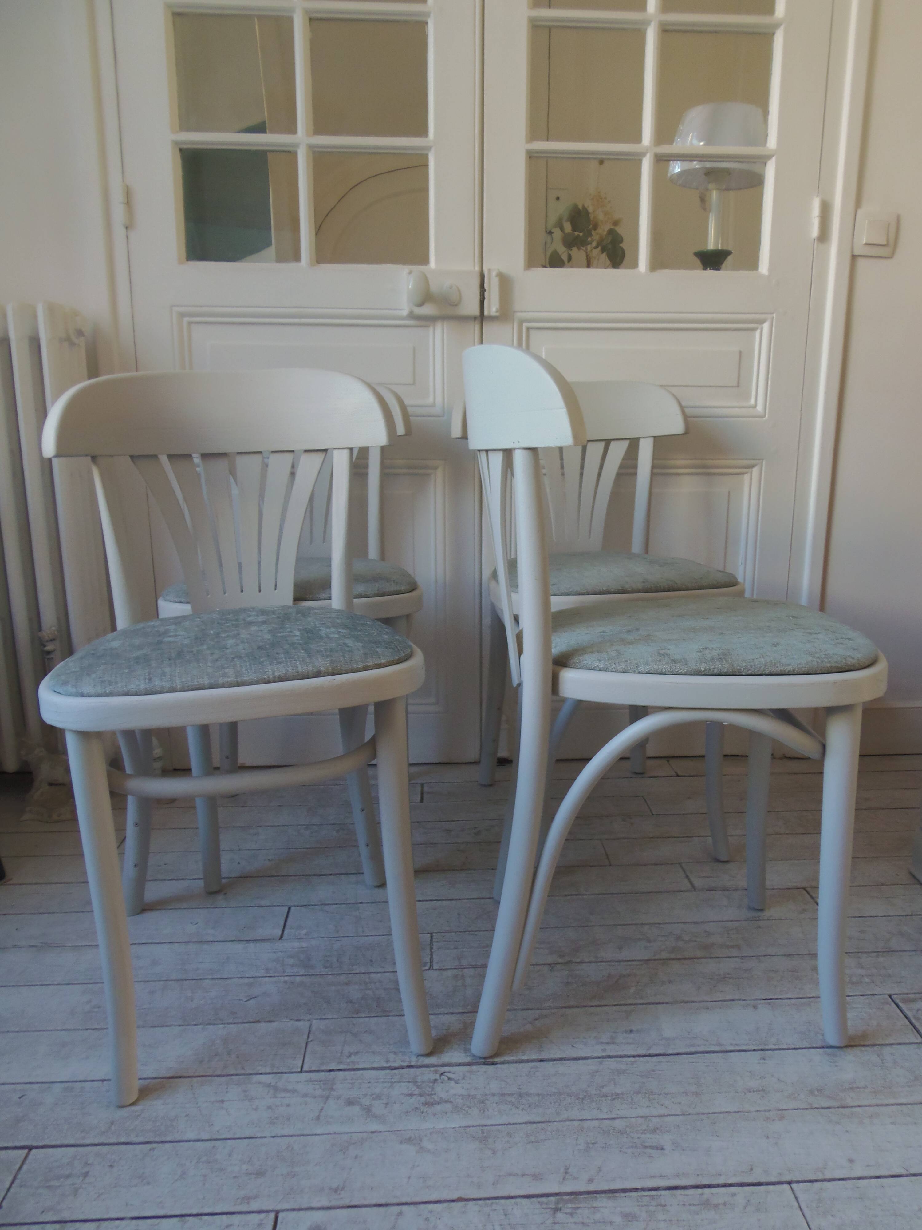 Set of 4 vintage bistro chairs enhanced in pearl grey.