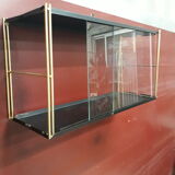 Wall-mounted Tomado showcase 1960