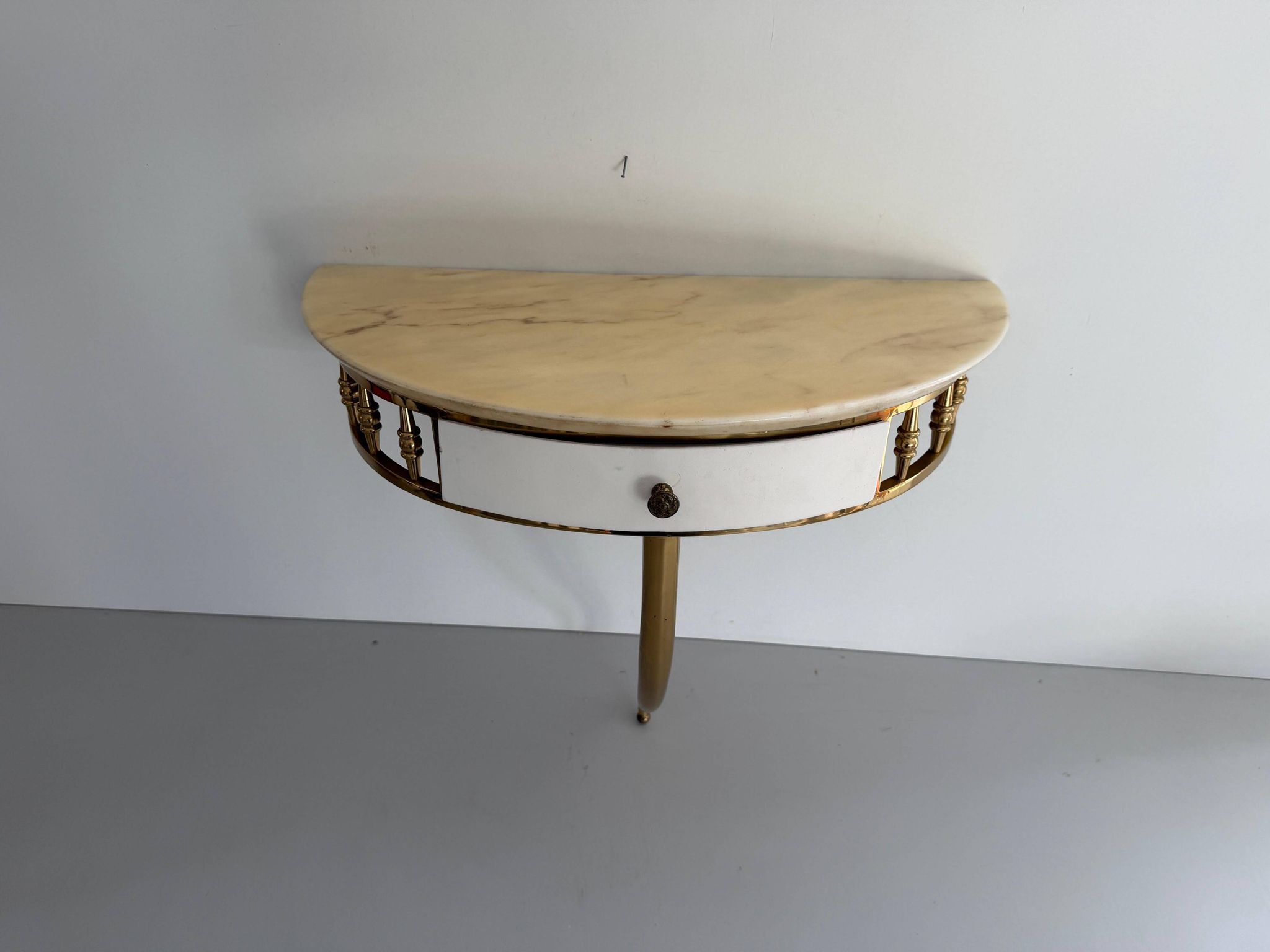 Floating wall console with drawer, brass body and marble top, 1960s, Italy
