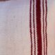 burgundy and white striped cushion in handmade wool