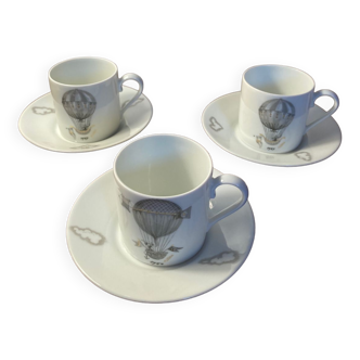 A set of 3 cups with Limoges porcelain saucers