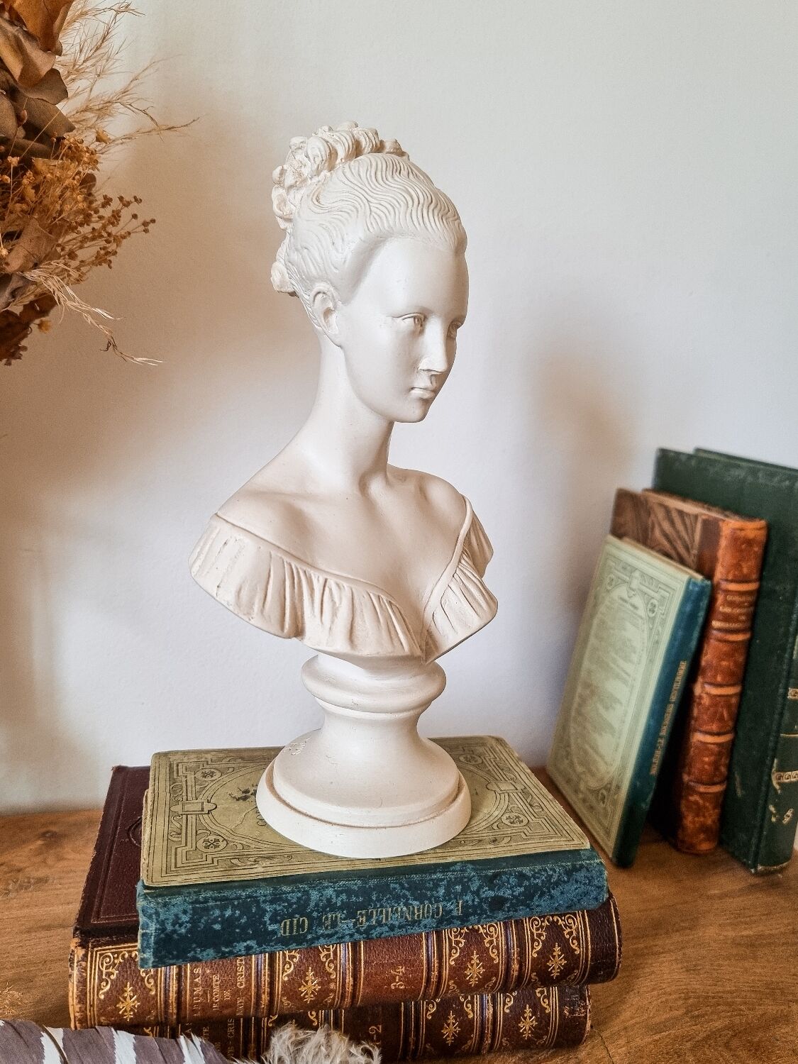 Resin women's bust, signed F.G.