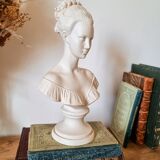 Resin women's bust, signed F.G.