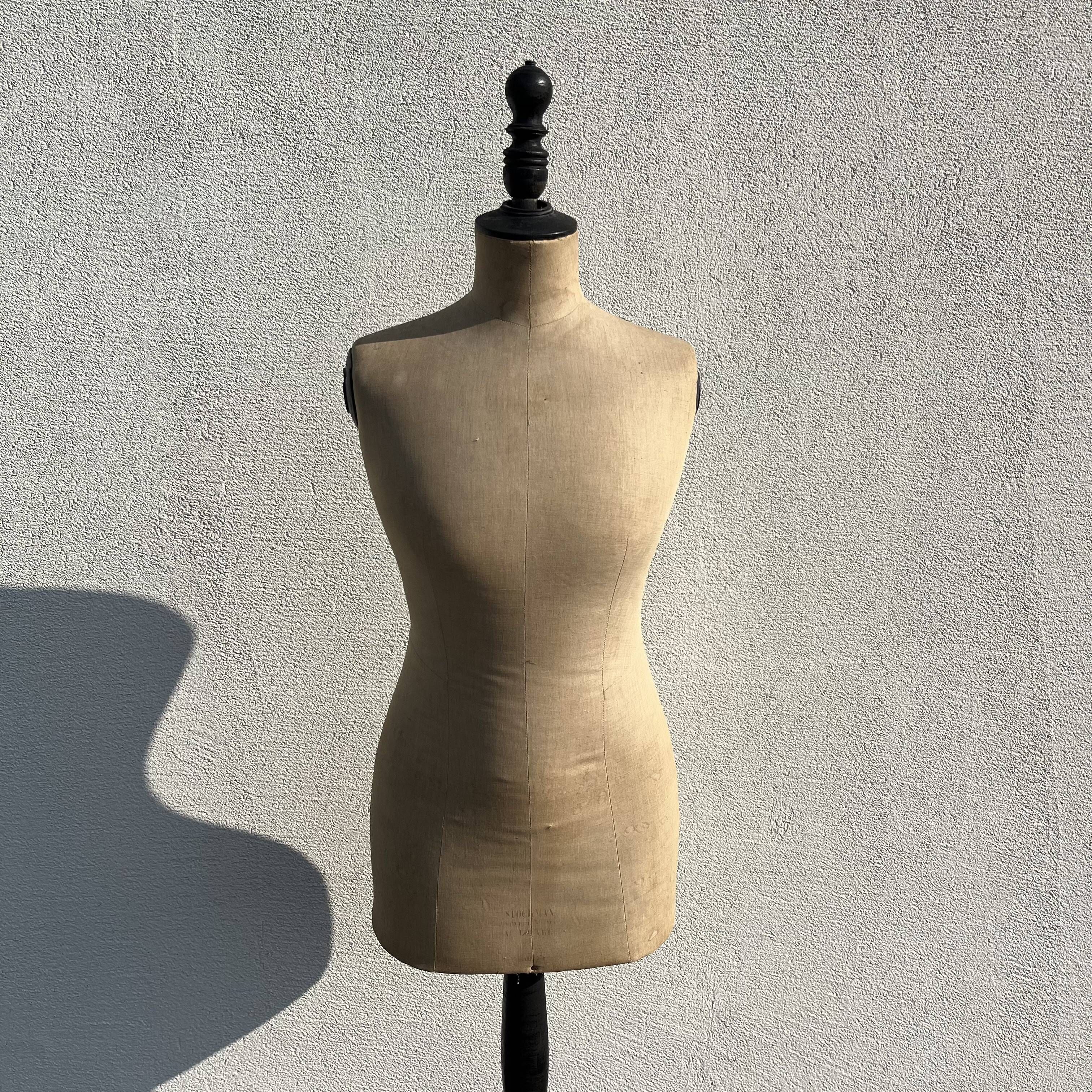 Antique mannequin in fabric and blackened wooden foot Stockman Paris Le Louvre
