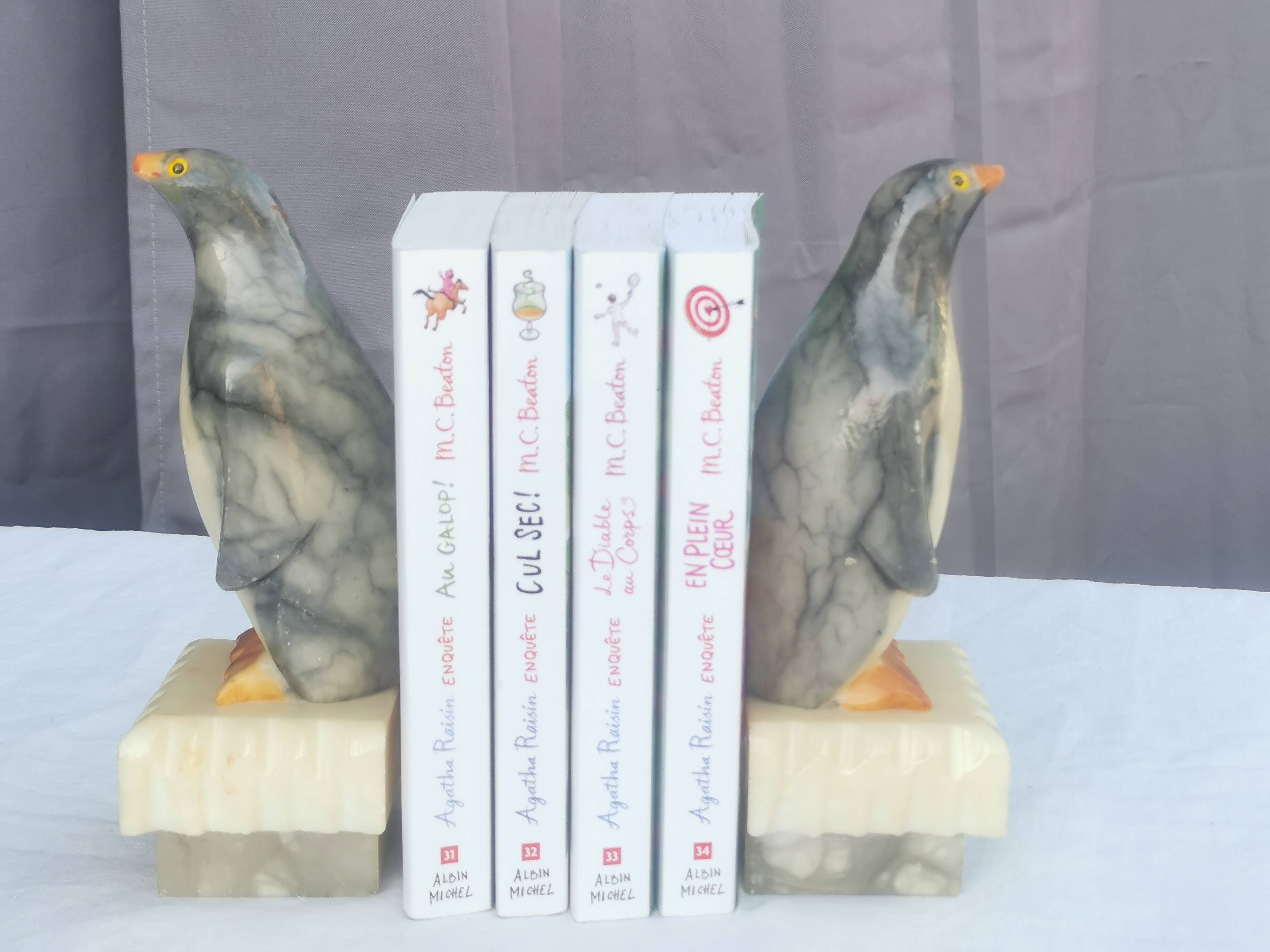 Pair of “penguins” bookends in alabaster