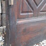 Porte d’entrée vitrée en chêne et grilles en fer, XIXème s.