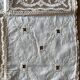 Former embroidered doily