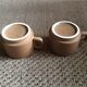 Duo of sandstone cups