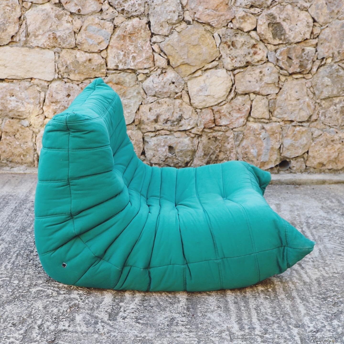 Chair and footstool Togo in green fabric by Michel Ducaroy for Ligne Roset