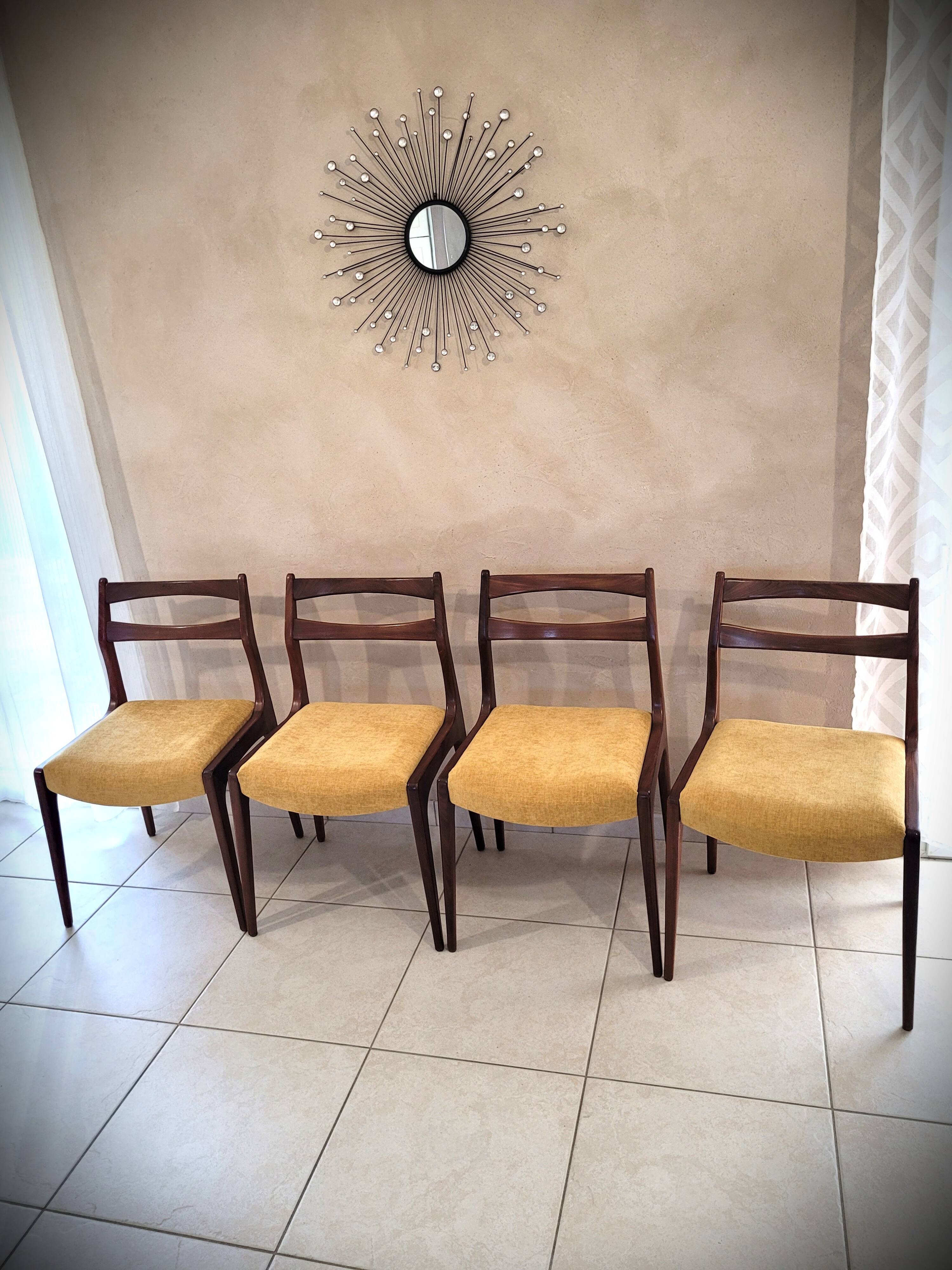 Set of 4 teak chairs with fabric seat in Scandinavian style.