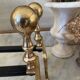 Old pair of brass andirons
