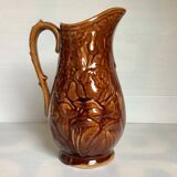 Brown pitcher with rose motifs