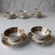 Lot de tasses en porcelaine fine dépareillées signées avec soucoupe