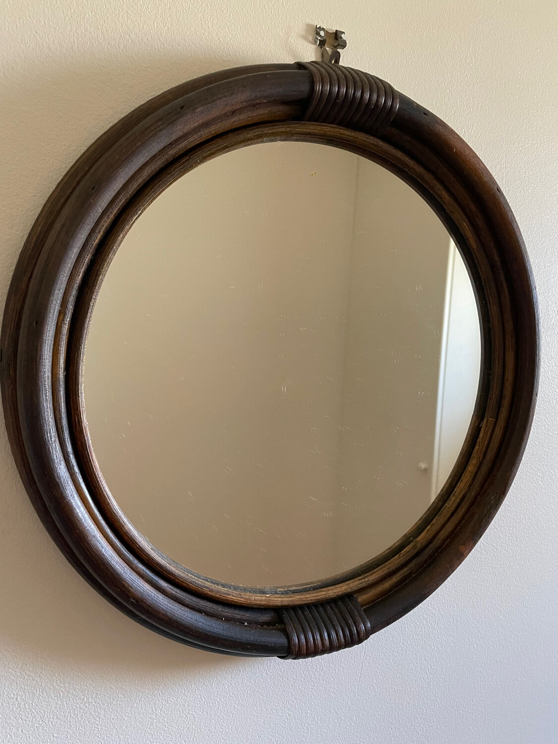 Round rattan mirror