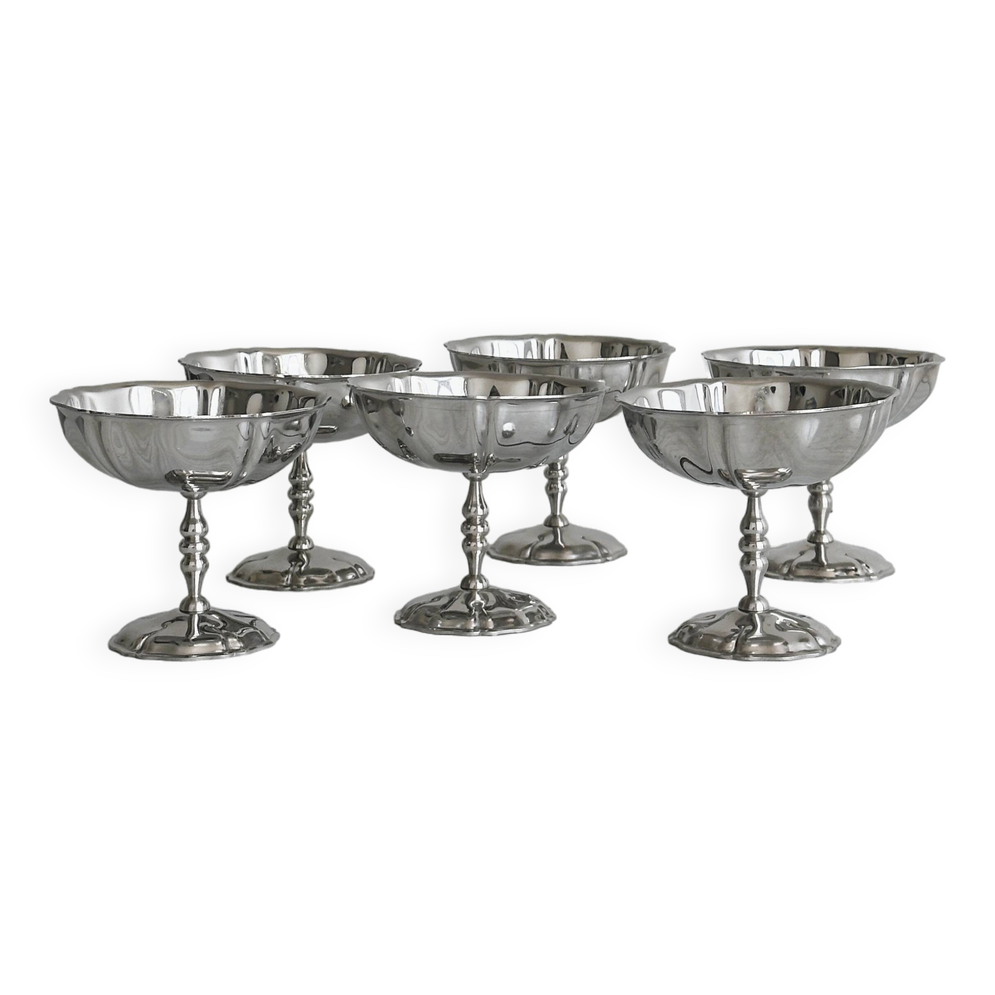 6 silver stainless steel bowls.