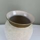 Cream speckled glazed vase with a gold rim, 1970s.