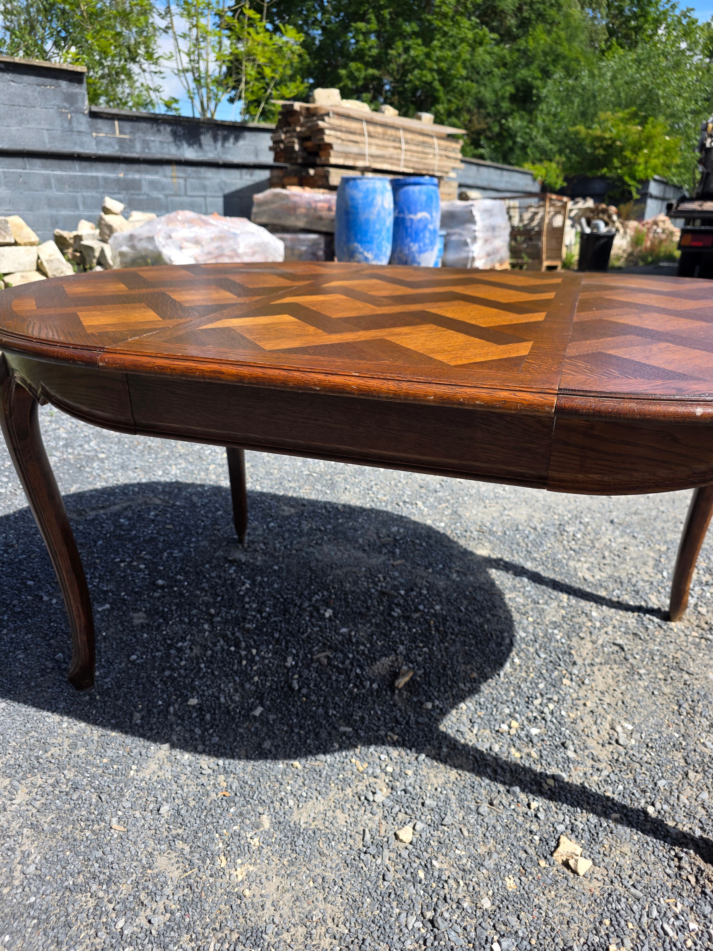 Extendable table in Louis XV style in oak (2 extensions)